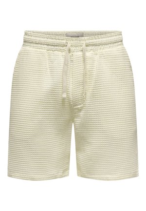 Helle gelbe Shorts aus strukturiertem Waffelstoff, mit elastischem Taillenbund und Kordelzug, Seitentaschen und einer lockeren Passform.