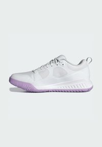 White athletic shoe with a textured upper, mesh panels, and a light purple sole. Features laces and a sturdy heel tab.