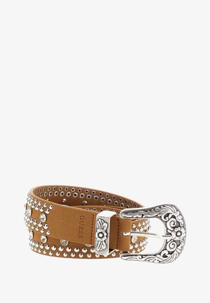 Tan leather belt with silver studs and a floral engraved metal buckle. Features a smooth texture and a wide design with decorative accents.