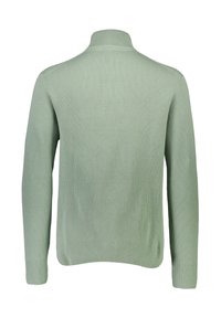 Grön ribbad pullover med hög hals, långa ärmar och texturerad stickning. Slät yta, figurnära siluett och svängd nederkant.