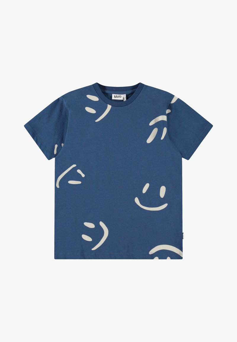 Mėlynas medvilnės marškinėliai su žaismingu baltų šypsenėlių raštu. Trumpomis rankovėmis ir apvalia iškirpte. Minkšta tekstūra.