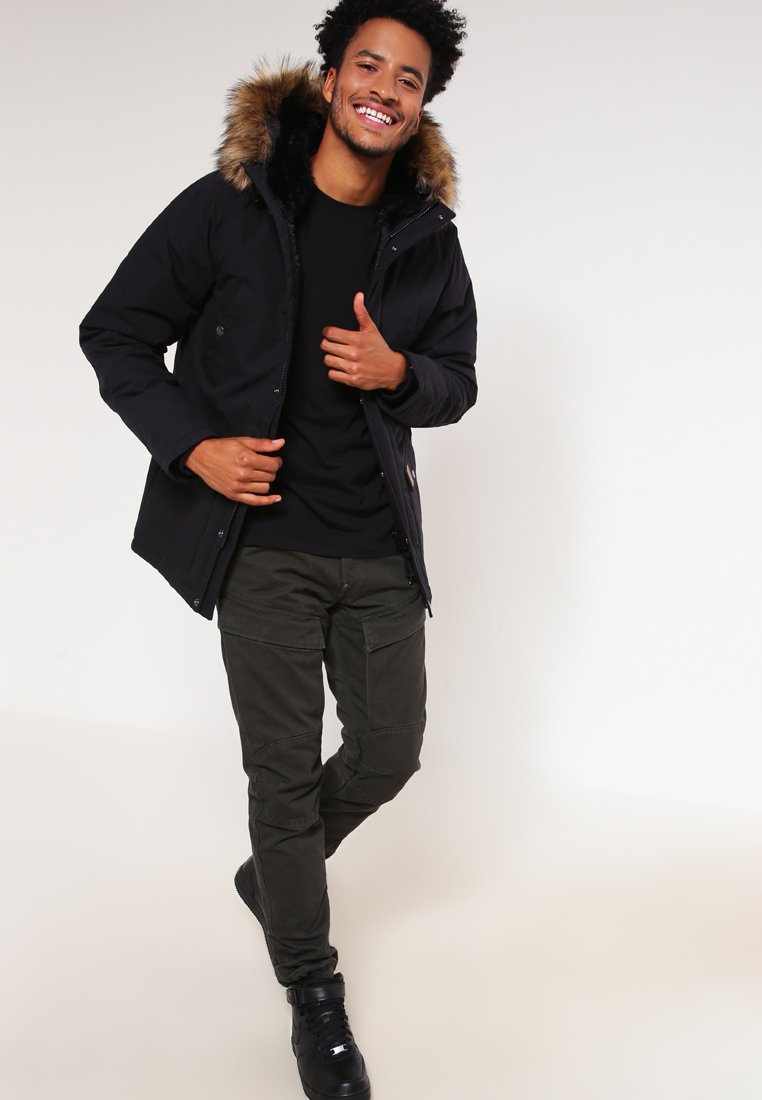 Carhartt WIP TRAPPER Vinterkappa rock black Zalando.se Carhartt WIP TRAPPER Vinterjacka dark firblack Zalando.se