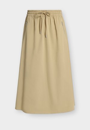 Μπεζ φούστα μήκους μέχρι το γόνατο με ελαστική μέση, κορδόνι και πλαϊνές τσέπες με φερμουάρ σε μονόχρωμο φόντο.