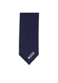 Γραβάτα ναυτικού μπλε φτιαγμένη από υφαντό ύφασμα με λεία υφή· διαθέτει το κεντητό λογότυπο "BOSS" σε λευκό στο πλατύ άκρο.