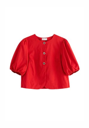 Blusa rossa a maniche corte con scollatura rotonda, maniche a palloncino e tre bottoni metallici. Tessuto liscio con design a busto aderente.