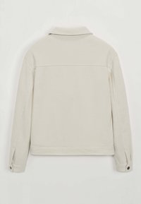 Veste en velours côtelé gris clair dotée d'un col, de manches longues, de poignets à bouton et d'une surface texturée avec une coupe droite à l'ourlet.