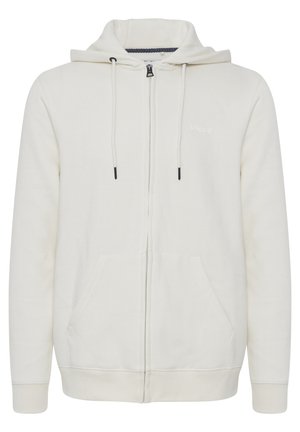 Creme zip-up hoodie lavet af blødt stof, med snøre i hætten, to forlommer og et lille "blend" logo på brystet.