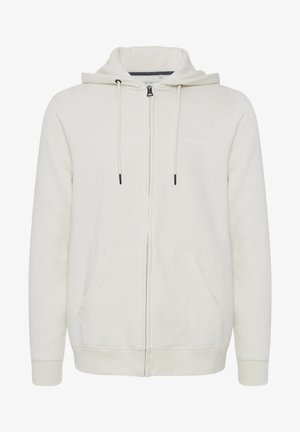 Creme zip-up hoodie lavet af blødt stof, med snøre i hætten, to forlommer og et lille "blend" logo på brystet.