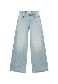 Jean denim bleu clair à jambes larges avec de petits points colorés éparpillés et un design standard à cinq poches.