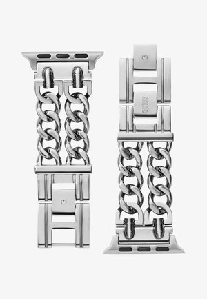 Srebrny metalowy pasek zegarka z połączonymi ogniwami, zapięcie w stylu belki oraz wygrawerowane logo marki. Gładka, polerowana powierzchnia o eleganckim designie.