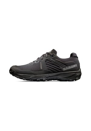 Scarpa da trail running Mammut nera con suola strutturata, design con lacci e etichetta Gore-Tex sul lato, mostrata di profilo laterale.