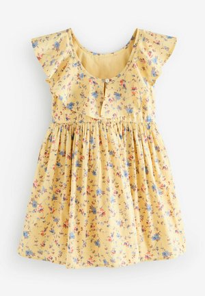 Rumena cvetna obleka z nabranim ovratnikom, kratkimi rokavi in podrobnostmi s gumbi. Ima nabran pas in modre ter rdeče cvetlične vzorce.