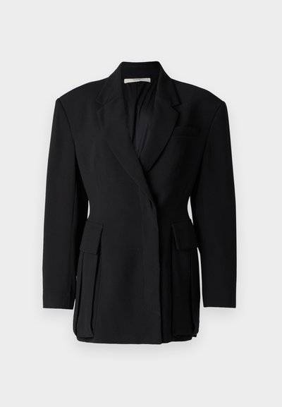 Black blazer with a single-breasted design, notched lapels, dual front patch pockets, and a textured fabric finish.