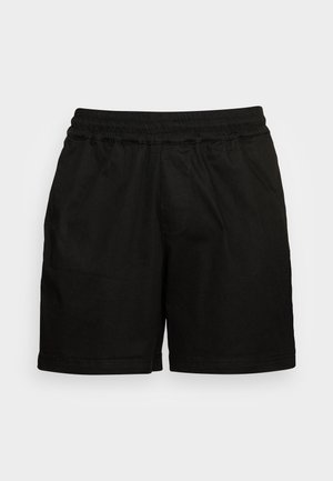 Schwarze Shorts aus weichem Stoff, mit einem elastischen Bund, einer lockeren Passform und einem schlichten Design ohne zusätzliche Details oder Muster.