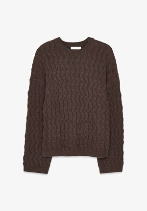 Brūns adīts džemperis ar teksturētu rakstu, ar apaļu kakla izgriezumu un garām piedurknēm. Audums ir mīksts un masīvs.