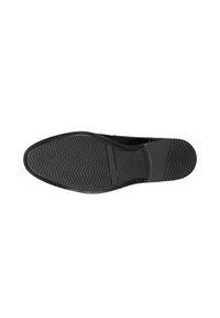 Suola di scarpa nera con un motivo a zigzag testurizzato per una migliore aderenza. Presenta un design in gomma liscia e un sottile dettaglio del logo vicino al tallone.