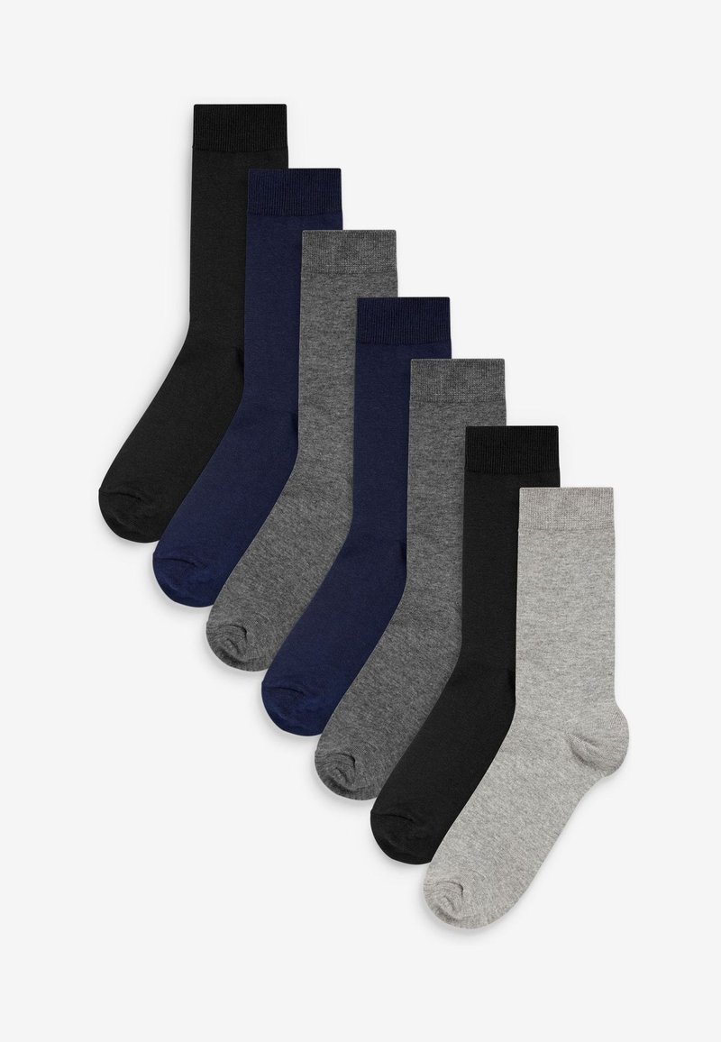 Sæt af otte sokker i forskellige farver: sort, mørkeblå, grå og lys grå. Fremstillet af et glat strikket stof med ribbede manchetter.