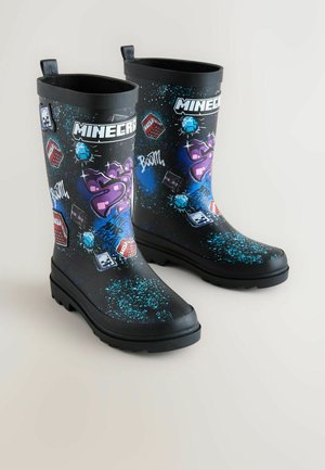 Cizme negre impermeabile din cauciuc, cu grafice în albastru și mov tematice Minecraft, având pictograme decorative și text îndrăzneț pe o suprafață texturată.