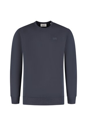 Navy pullover sweatshirt with long sleeves, crew neck, ribbed cuffs, and hem; features a small logo on the chest. Soft fabric texture.