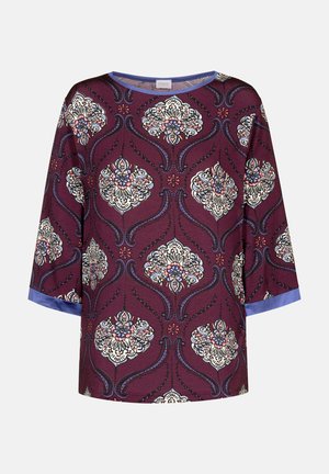 Wijnkleurige top met bloempatronen in crème, blauw en roze. Heeft driekwart mouwen en een blauwe accent aan de onderrand. Zacht stof.