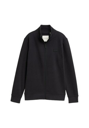Schwarze ZIP-Jacke mit hohem Kragen, aus einem weichen Stoff gefertigt. Verfügt über ein minimalistisches Design und ein kleines Logo-Patch auf der linken Brust.