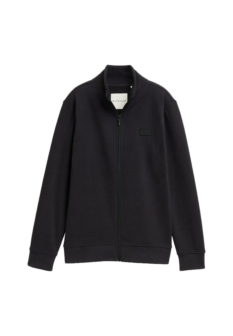 Schwarze ZIP-Jacke mit hohem Kragen, aus einem weichen Stoff gefertigt. Verfügt über ein minimalistisches Design und ein kleines Logo-Patch auf der linken Brust.