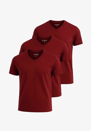 Tre burgunderfarvede v-neck t-shirts lavet af blødt stof, med korte ærmer og et simpelt, rent design. Velegnet til afslappet brug.