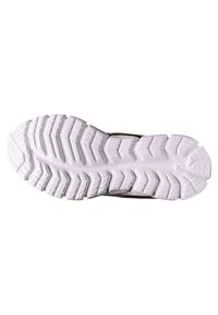 Suela de zapatilla deportiva negra con una gruesa suela exterior de goma blanca texturizada que presenta profundos surcos y patrones para mayor tracción.