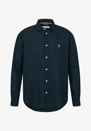 Dunkelblaues Leinenhemd mit Button-Down-Kragen, langen Ärmeln und abgerundetem Saum. Besitzt weiße Knöpfe und ein kleines gesticktes Logo.