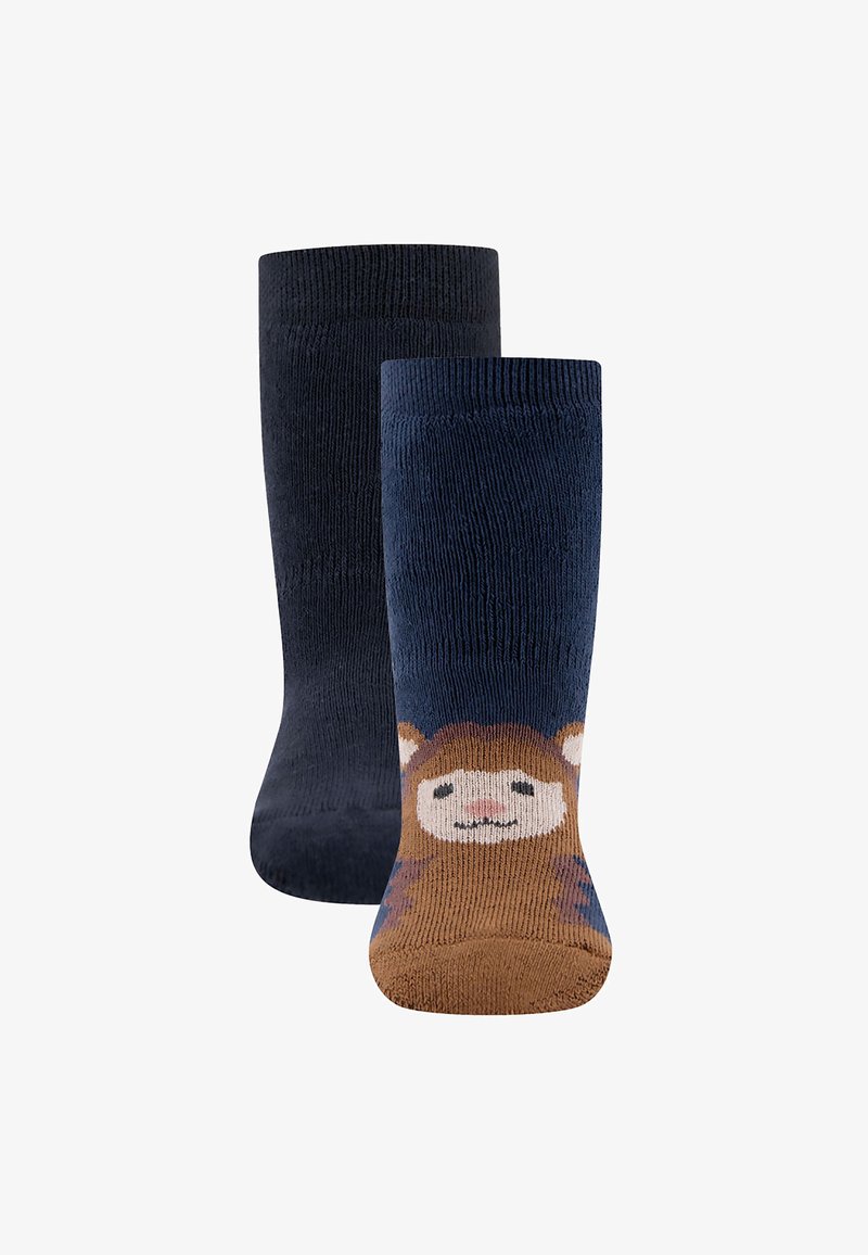 Bawełniane skarpetki do kolan, jedna w jednolitym granacie, a druga z brązową twarzą lwa na palcu, z teksturowanym ściągaczem zapewniającym dopasowanie i komfort.