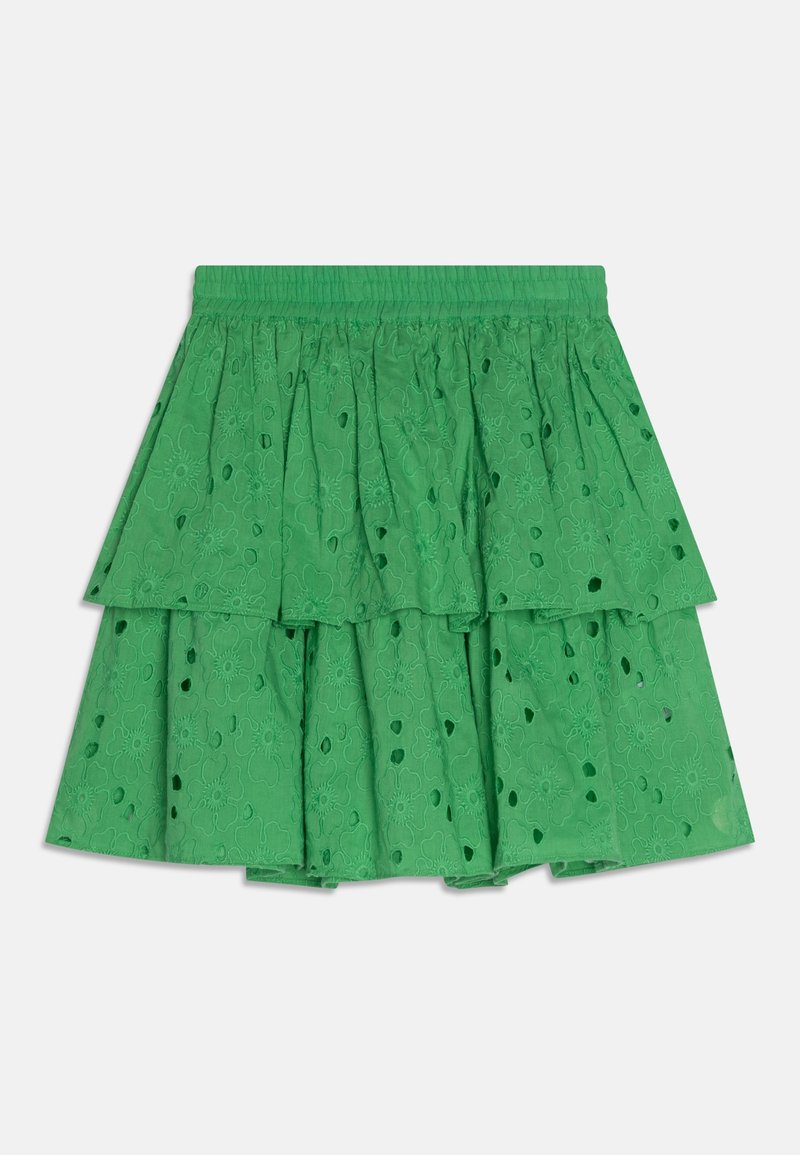 Jupe verte à volants fabriquée dans un tissu texturé avec des découpes florales. Taille élastique et trois volants superposés créent du volume.