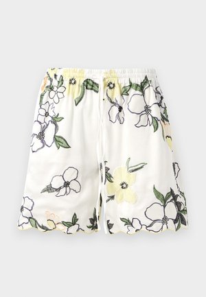 Weiße Shorts mit floralem Stickerei in Gelb, Lila und Schwarz. Mit einem elastischen Bund und einem gewellten Saum. Kordelzugverschluss.