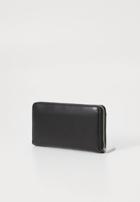 Calvin Klein EMBOSSED LOGO LARGE ZIP AROUND - Portafoglio - black