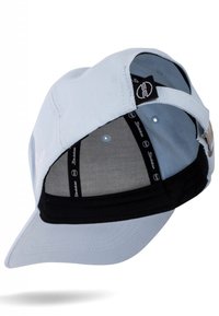 Light blue cap with a curved visor, featuring a black adjustable strap and gray mesh lining inside. Logo and brand tags visible.
