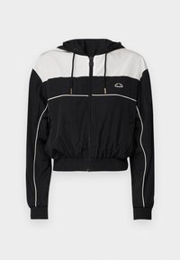 Chaqueta corta en blanco y negro con capucha, cierre de cremallera, puños acanalados y cinturilla elástica; cuenta con rayas blancas y detalle de logo en el pecho.