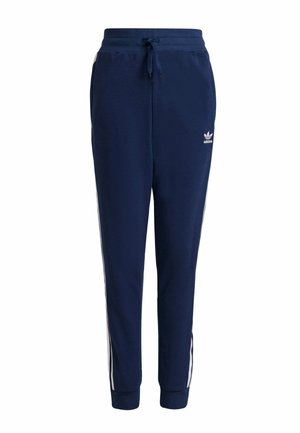 Navy blue Adidas track pants with white side stripes, elastic cuffs, drawstring waistband, and small white Adidas logo on the thigh.