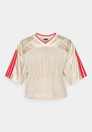 Short-sleeve, beige mesh jersey with red accents. V-neck design features large "adidas" branding and three red stripes on each sleeve.