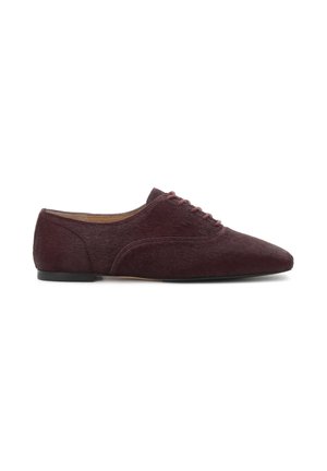 Burgundy lace-up flats with a smooth, textured surface and pointed toe. Features a low black heel and curved side detailing.