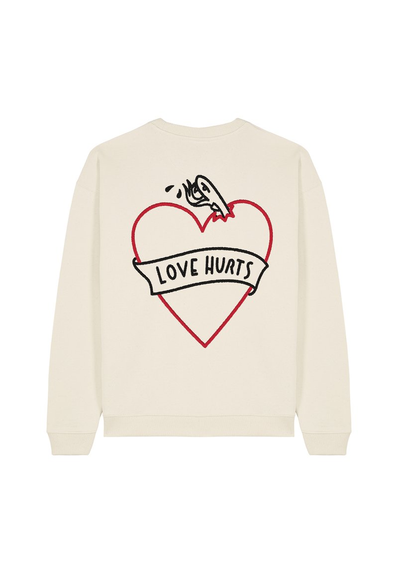 Felpa color crema con una grafica di un cuore contornato di rosso e il testo nero "LOVE HURTS", con un design cartoonesco sul retro.