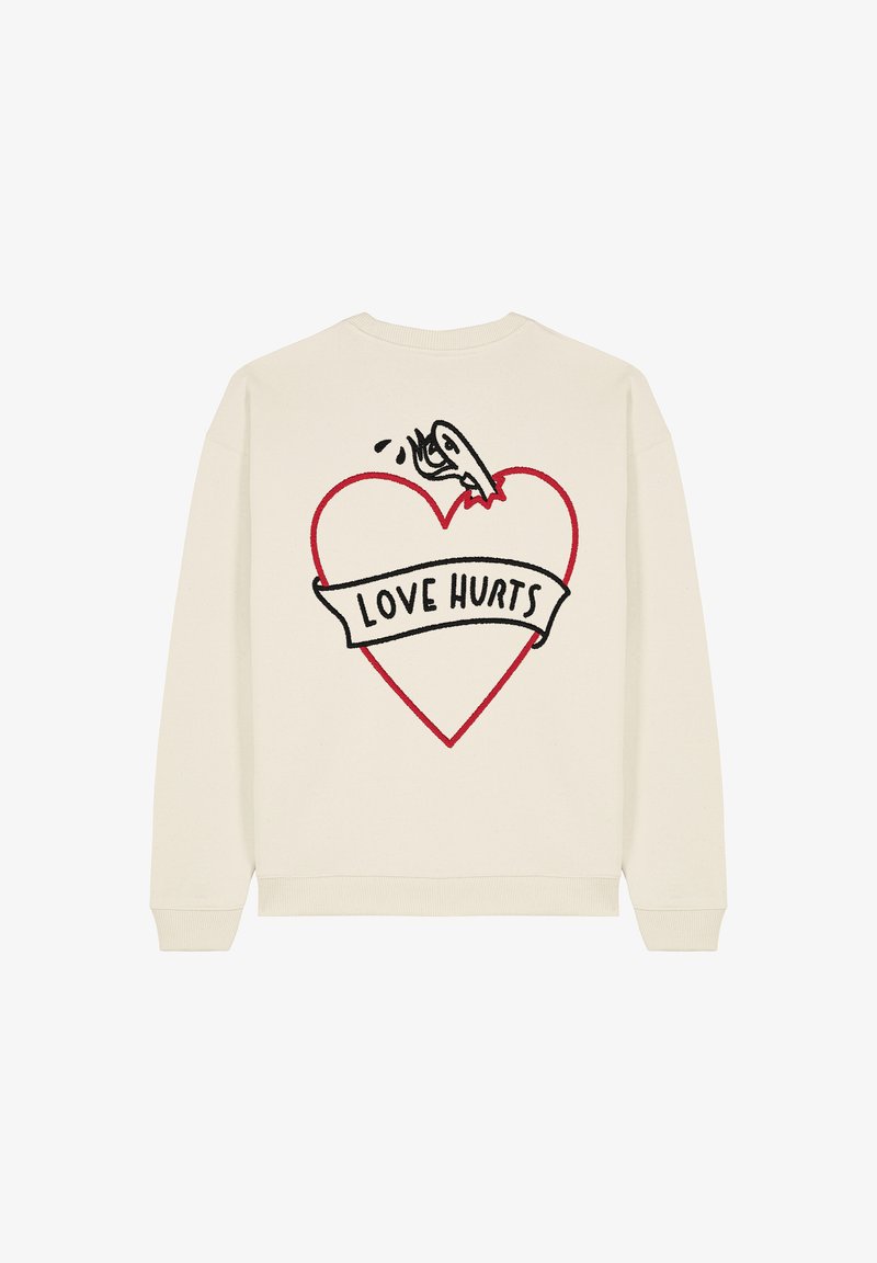 Felpa color crema con una grafica di un cuore contornato di rosso e il testo nero "LOVE HURTS", con un design cartoonesco sul retro.