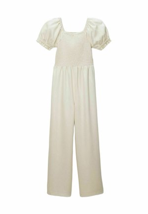 Combinaison couleur crème avec encolure carrée froncée, manches courtes bouffantes et pantalons larges.