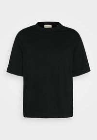 T-shirt noir à manches courtes avec col rond, coupe décontractée et logo discret de la marque sur la poitrine.