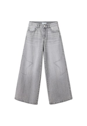 Jean denim gris à jambes larges, taille haute, avec des motifs cloutés en forme d'étoile sur les deux jambes.