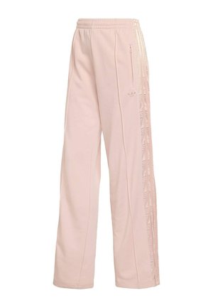 Light pink sweatpants made of soft fabric, featuring a drawstring waistband, side zipper pockets, and diagonal striped accents along the sides.