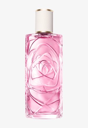 Hohe rechteckige Glasparfümflasche mit pinkfarbener Flüssigkeit und einem weißen strukturierten Verschluss mit goldenem Rand.
