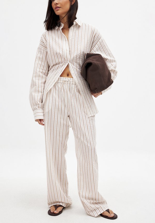 MID WAIST - Stoffhose