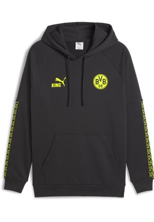 Zwarte hoodie met gele Puma-logo, de tekst "KING", het embleem van Borussia Dortmund BVB 09 en gestreepte gele patronen op de mouwen.