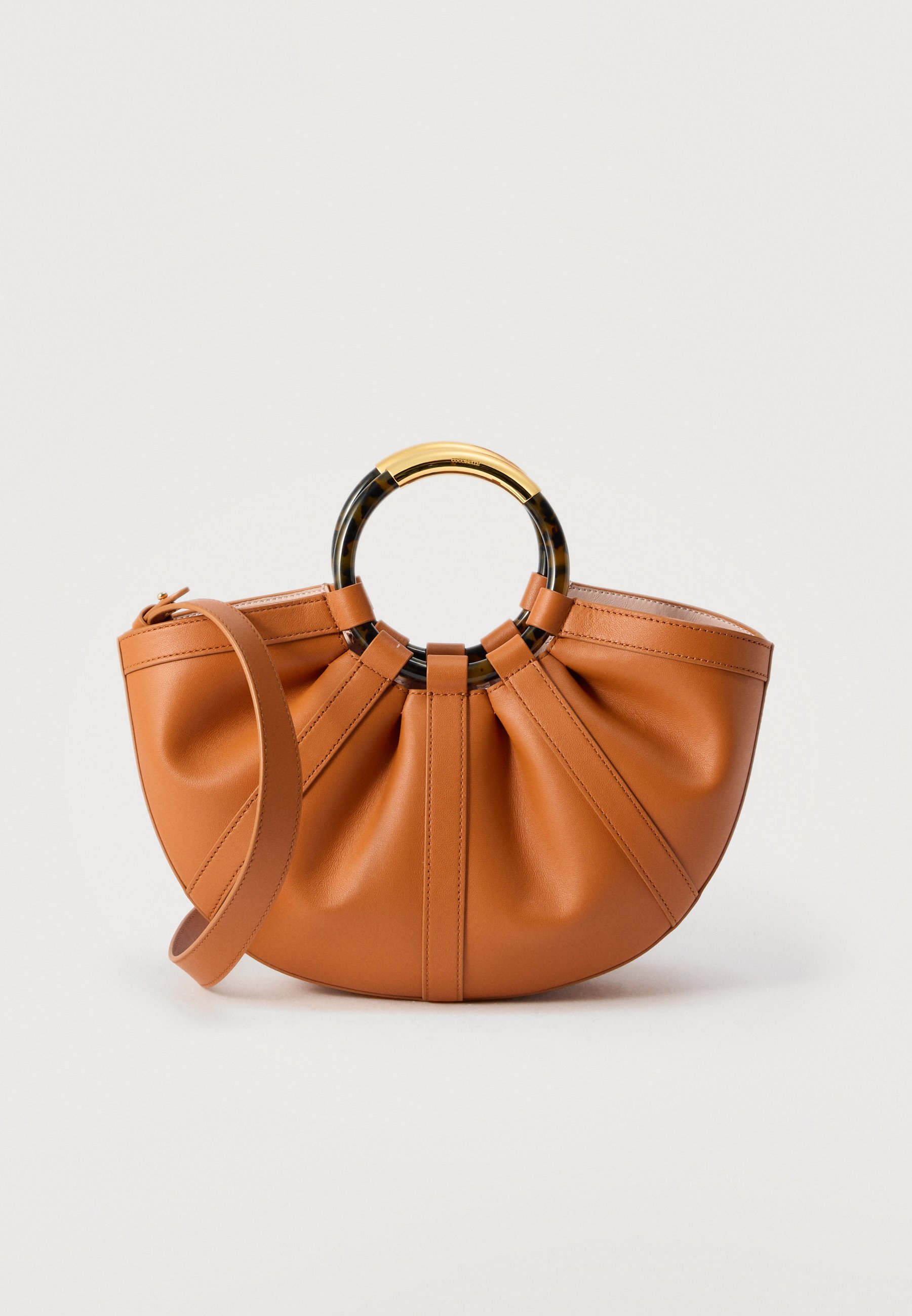 Coccinelle SHELL - Handbag - crab/ochre - Zalando.co.uk