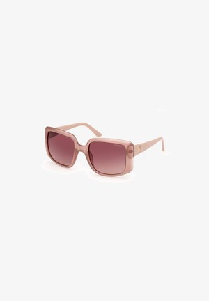 Sunglasses with a chunky, square design. Transparent light pink frame with gradient dark pink lenses. Branded arm detail with a logo.