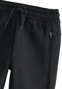 Next SLIM FIT JOGGERS - Träningsbyxor - black